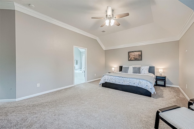 bedroom with ensuite bath, ceiling fan, light carpet, and vaulted ceiling