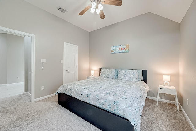 carpeted bedroom with high vaulted ceiling and ceiling fan