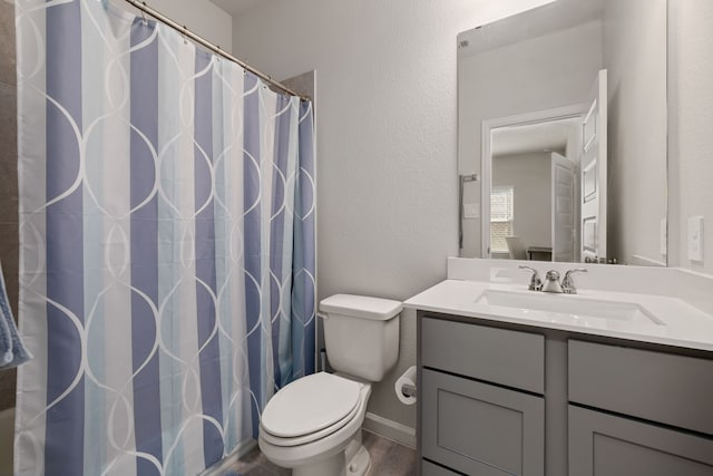 bathroom with vanity, hardwood / wood-style flooring, toilet, and curtained shower