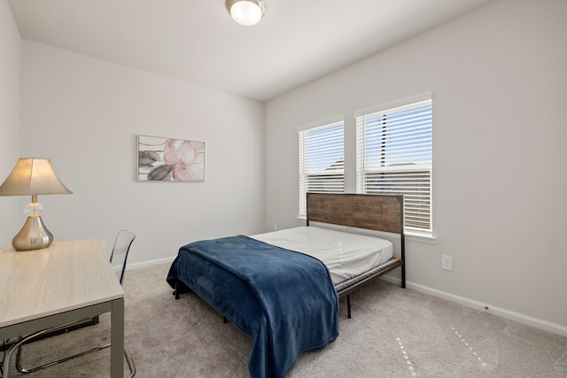 bedroom featuring carpet