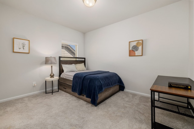 bedroom with light carpet