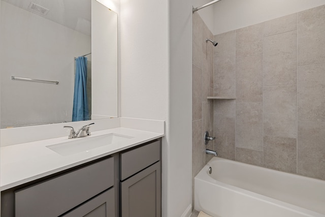 bathroom with vanity and shower / tub combo with curtain