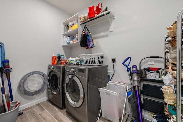 laundry area with washing machine and dryer