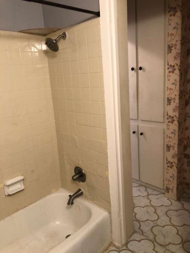 909 Silber Rd Unit 4A, Houston, TX 77024 - bathroom with  shower combination and tile patterned floors