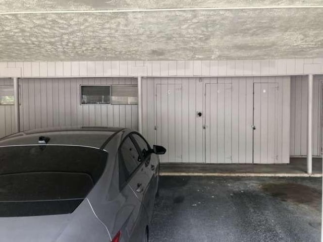 909 Silber Rd Unit 4A, Houston, TX 77024 - garage with a storage shed