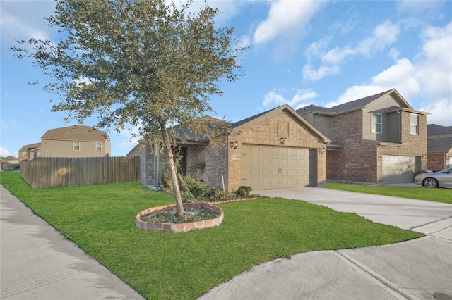 view of front of home with a garage and a front lawn