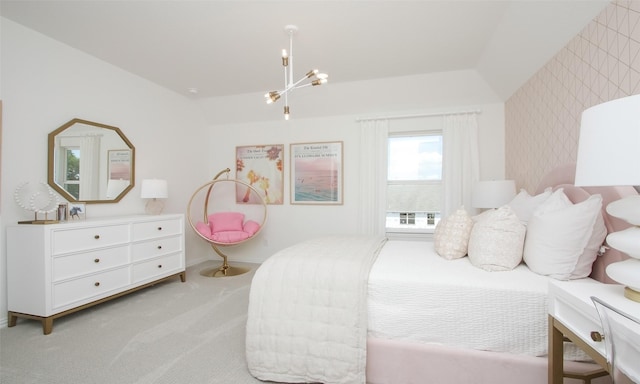 bedroom featuring a notable chandelier and light colored carpet