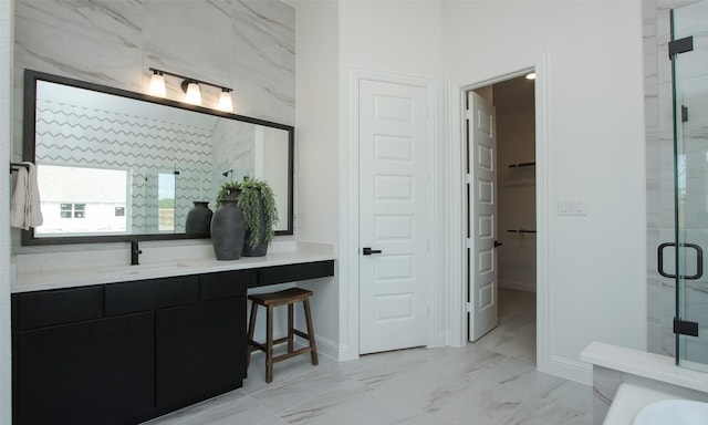 bathroom featuring vanity and an enclosed shower