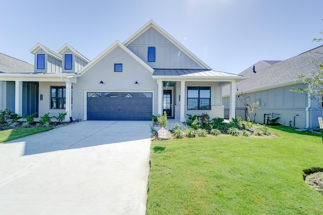 view of front of home with covered porch and a front yard