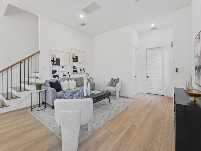 living room with light hardwood / wood-style floors