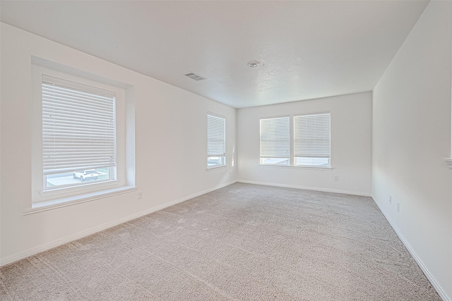 empty room with carpet floors