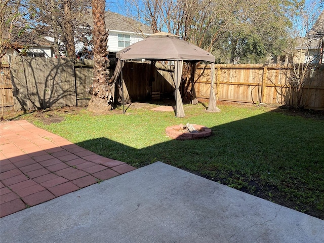 view of yard featuring a gazebo and a patio