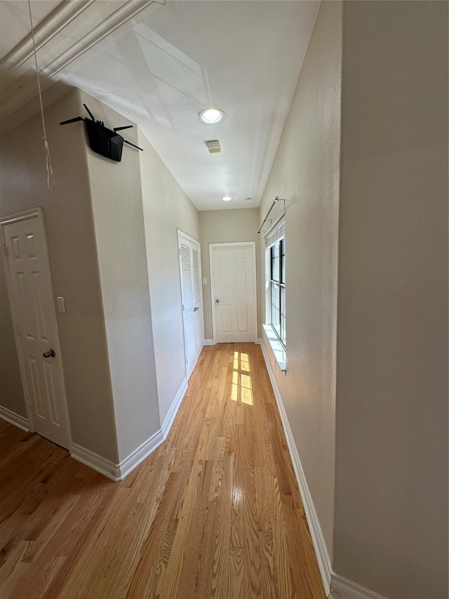 hallway featuring light wood-type flooring