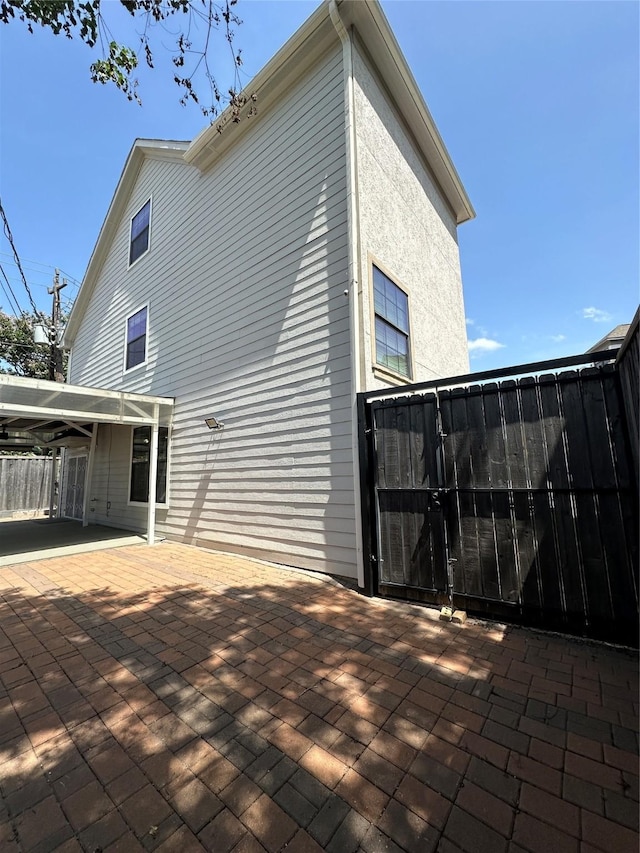 back of house featuring a patio