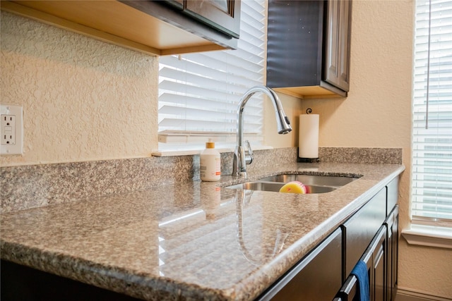 details with light stone counters and sink