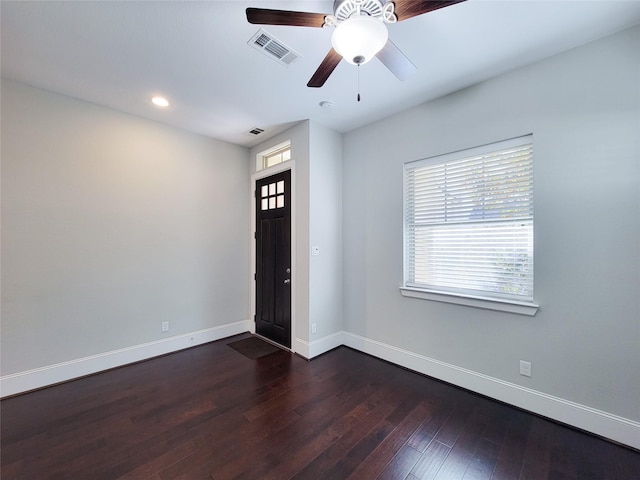 entryway with ceiling fan and dark wood-type flooring