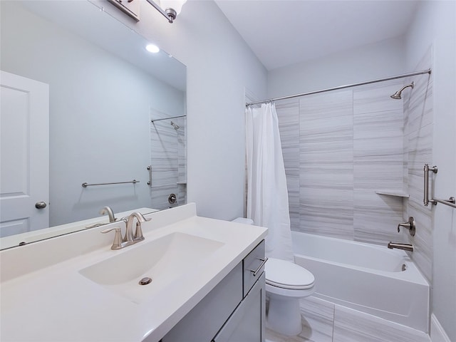 full bathroom with tile patterned floors, vanity, toilet, and shower / bath combo