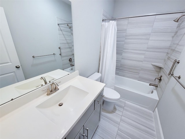 full bathroom with tile patterned flooring, shower / bath combo, vanity, and toilet