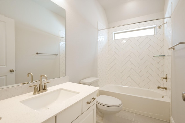 full bathroom with tile patterned flooring, vanity, toilet, and tiled shower / bath