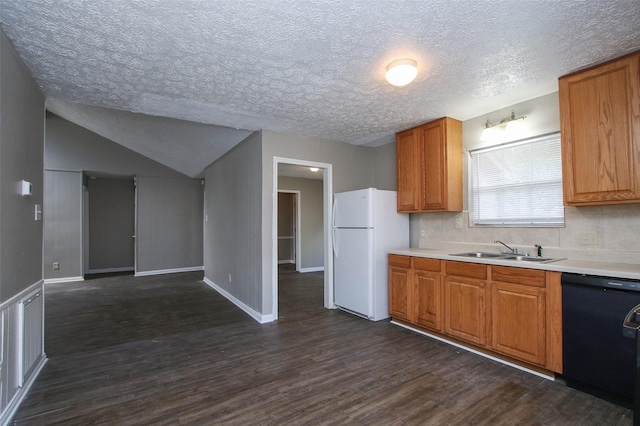 kitchen featuring sink, dark hardwood / wood-style floors, black dishwasher, tasteful backsplash, and white fridge