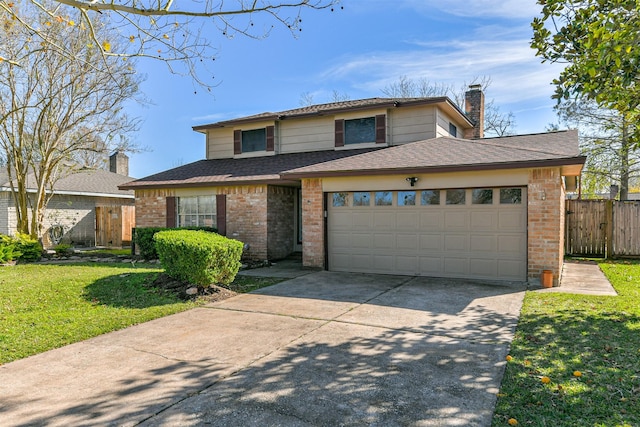 front of property featuring a front yard and a garage