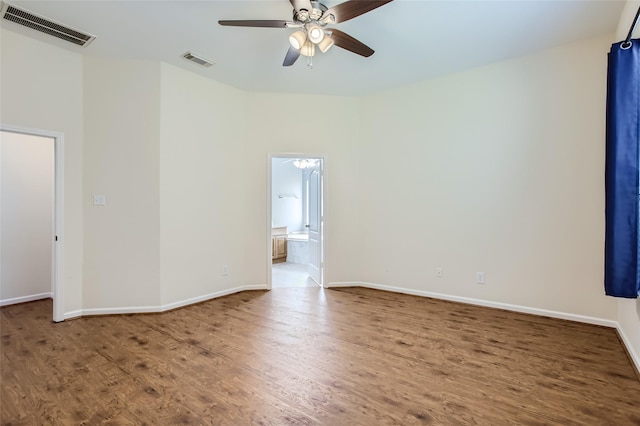 unfurnished room featuring hardwood / wood-style flooring and ceiling fan