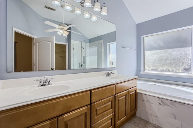 bathroom featuring plus walk in shower, lofted ceiling, tile patterned flooring, vanity, and ceiling fan