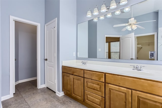 bathroom with vanity, tile patterned flooring, and ceiling fan