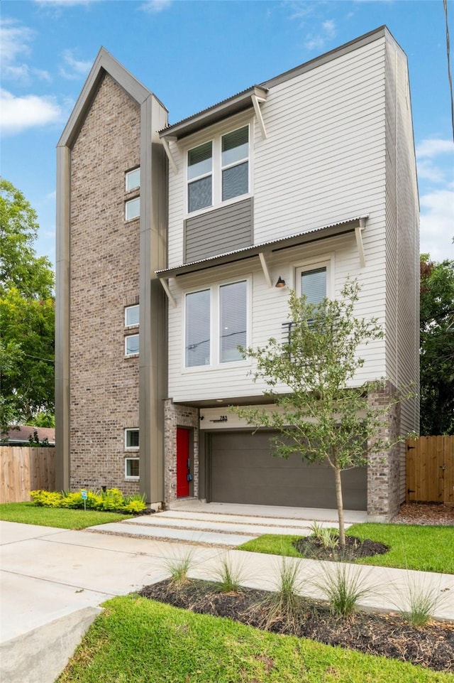 view of front of property featuring a garage