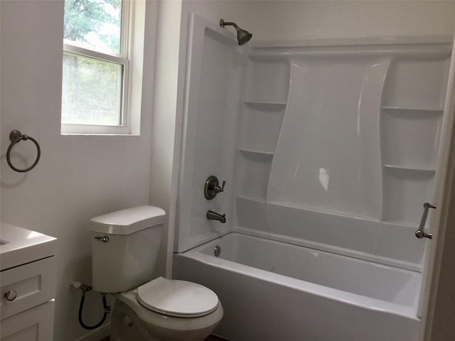 full bathroom featuring vanity,  shower combination, and toilet