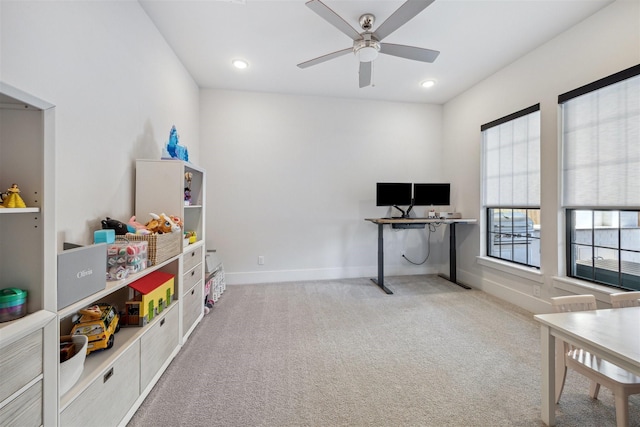 rec room with a ceiling fan, recessed lighting, light colored carpet, and baseboards