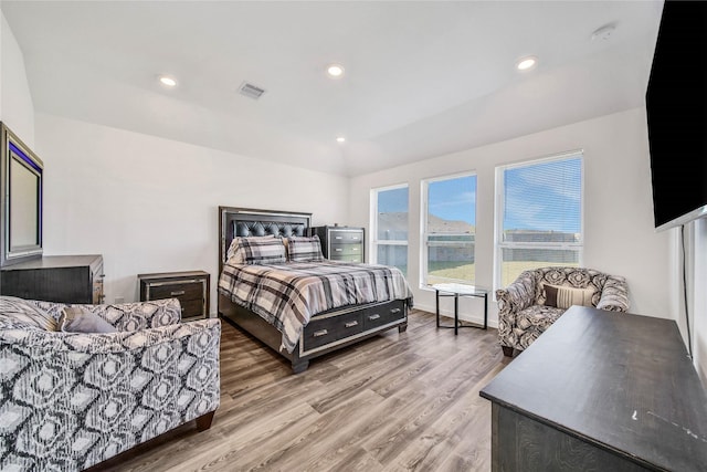 bedroom with wood-type flooring