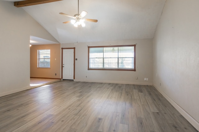 unfurnished room with beam ceiling, light hardwood / wood-style floors, high vaulted ceiling, and ceiling fan