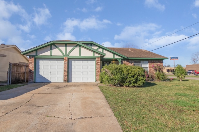 view of front of property with a garage and a front yard