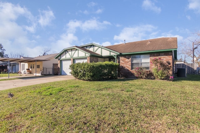 view of front of home featuring central AC unit, a garage, and a front yard