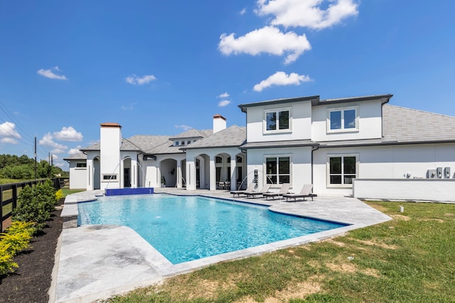 back of house featuring a patio area