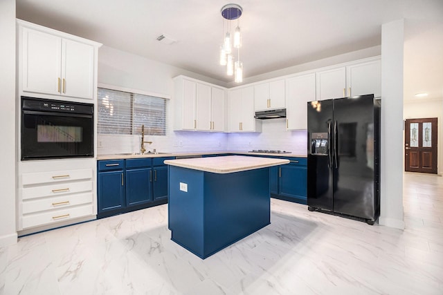 kitchen featuring blue cabinetry, sink, decorative light fixtures, a kitchen island, and black appliances