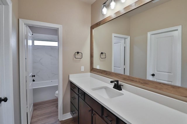 full bathroom featuring vanity,  shower combination, toilet, and wood-type flooring