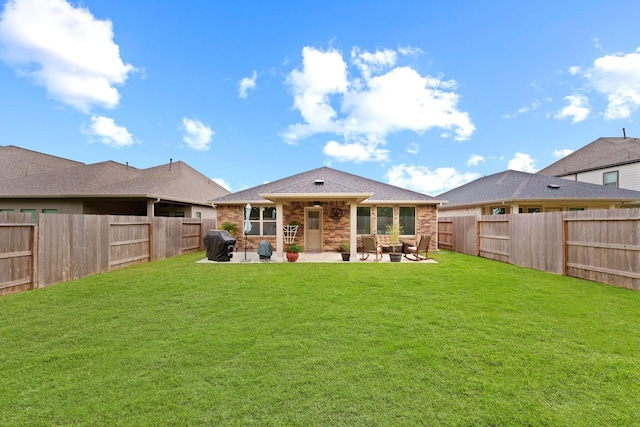 rear view of house with a lawn, an outdoor living space, ceiling fan, and a patio