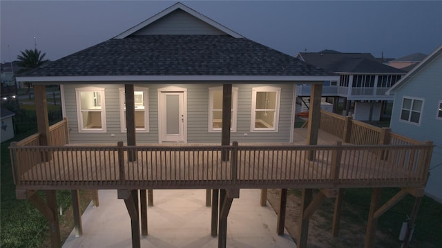 rear view of property with a deck