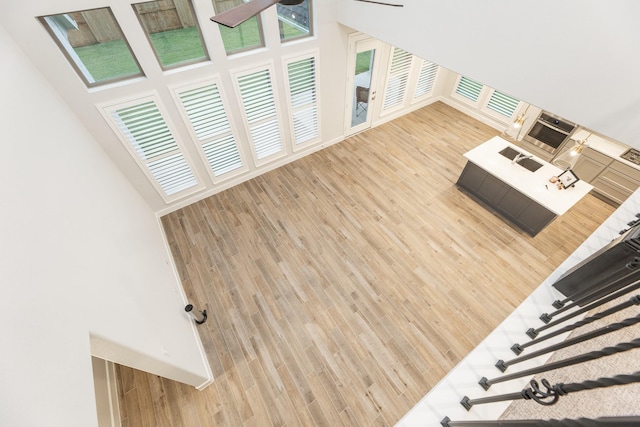 unfurnished living room with hardwood / wood-style flooring