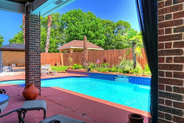 view of pool with a patio area