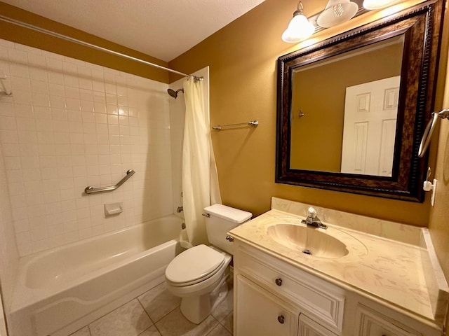 full bathroom featuring tile patterned floors, vanity, toilet, and shower / tub combo