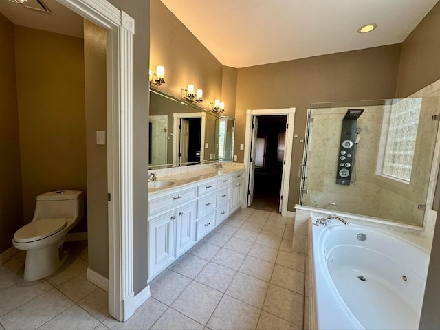 full bathroom with tile patterned flooring, vanity, separate shower and tub, and toilet