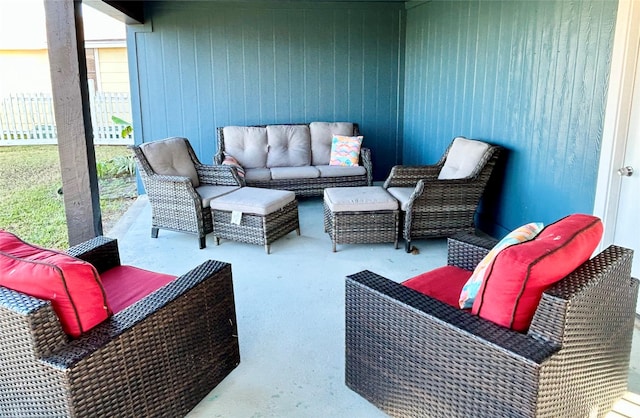 balcony with outdoor lounge area and a patio area