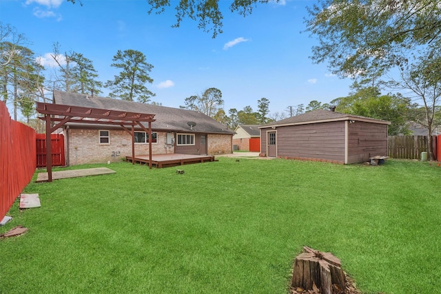 view of yard featuring a pergola and a wooden deck