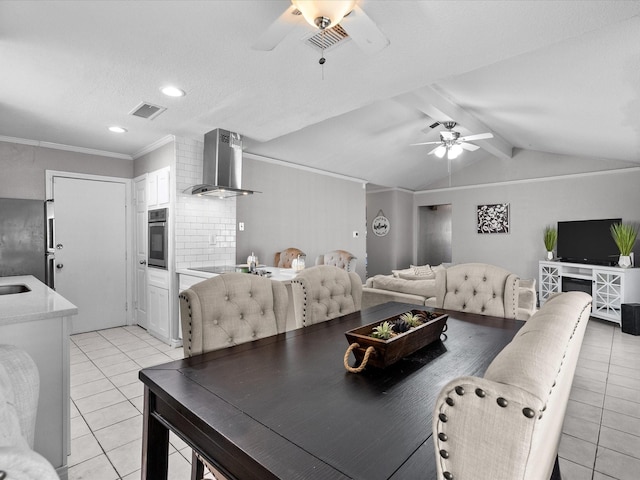 tiled dining room featuring vaulted ceiling with beams, crown molding, and a textured ceiling