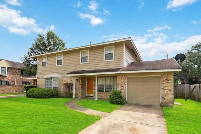 view of front of property featuring a garage and a front lawn