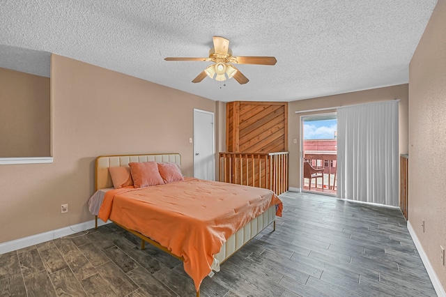 bedroom featuring ceiling fan, a textured ceiling, and access to outside