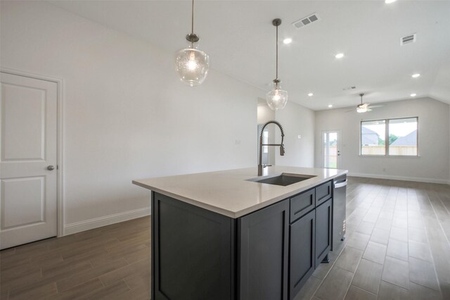 4030 Colony Ln, Missouri City, TX 77459 - kitchen with a sink, vaulted ceiling, light countertops, baseboards, and recessed lighting